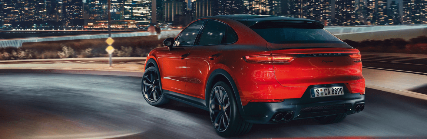 2019 Porsche Cayenne Coupe exterior rear driving in the city