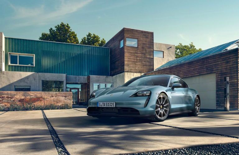 2019 Porsche Taycan front fascia driver side in front of house