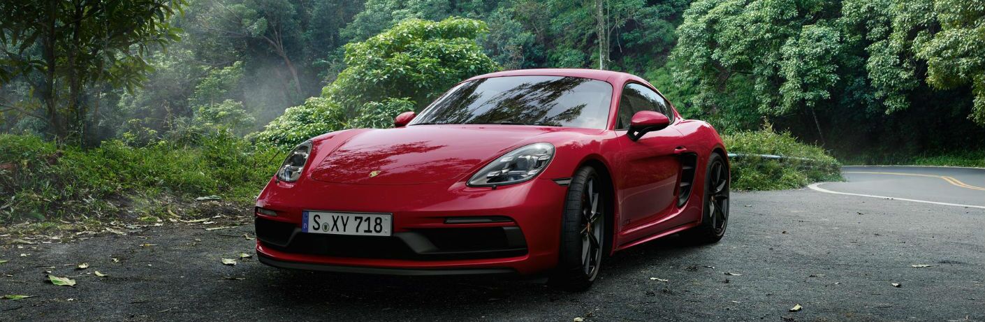 2019 Porsche 718 Cayman GTS parked in a woods