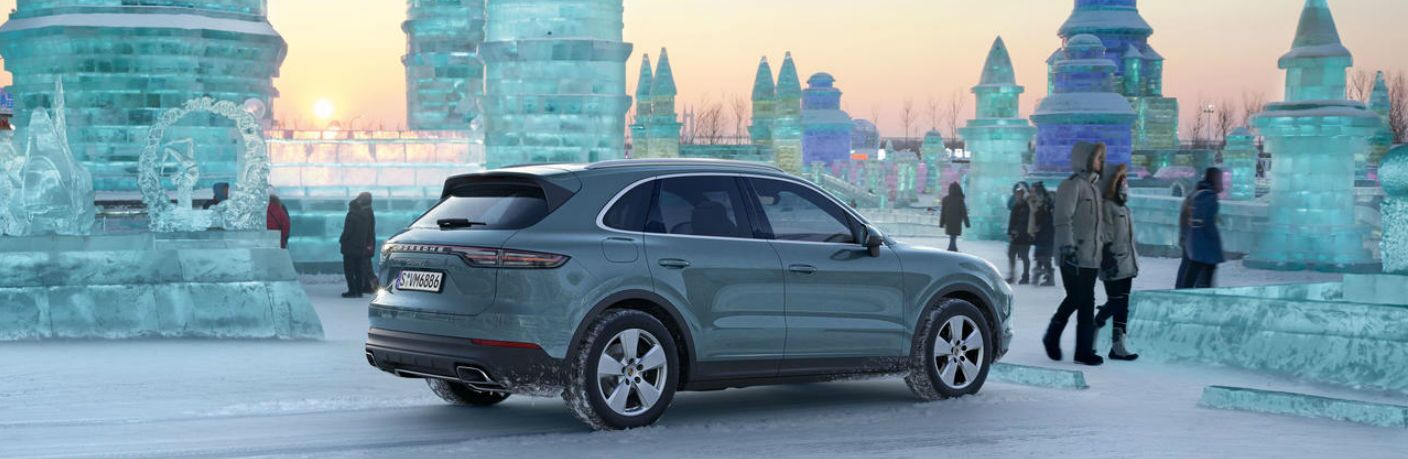 2019 Porsche Cayenne parked by ice sculptures