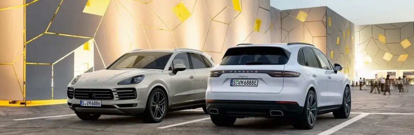 Two 2022 Porsche Cayenne parked side by side