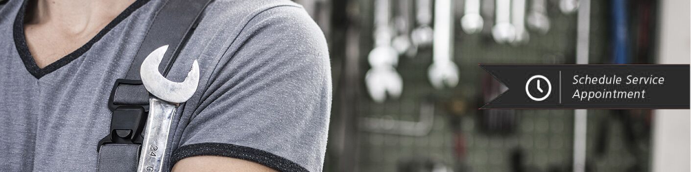 Mechanic holding a spanner