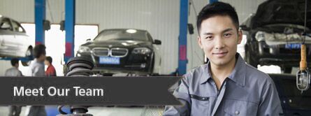 a technician standing at a dealership