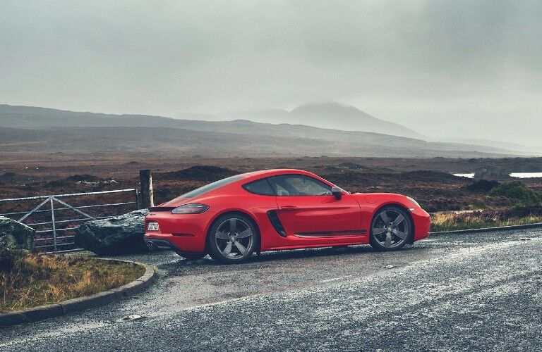 Profile of red 2020 Porsche 718 Cayman