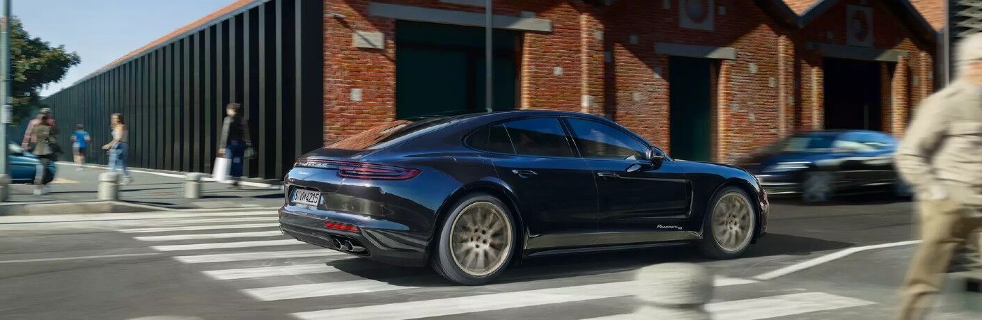 Grey 2020 Porsche Panamera driving