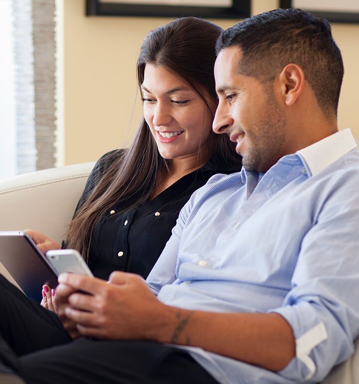 Couple using technology