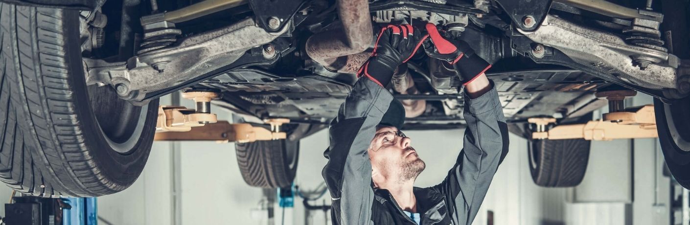 Car Mechanic fixing a vehicle