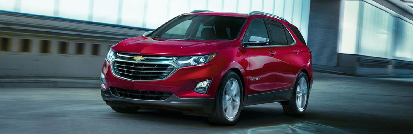 2018 Chevy Equinox red on the highway