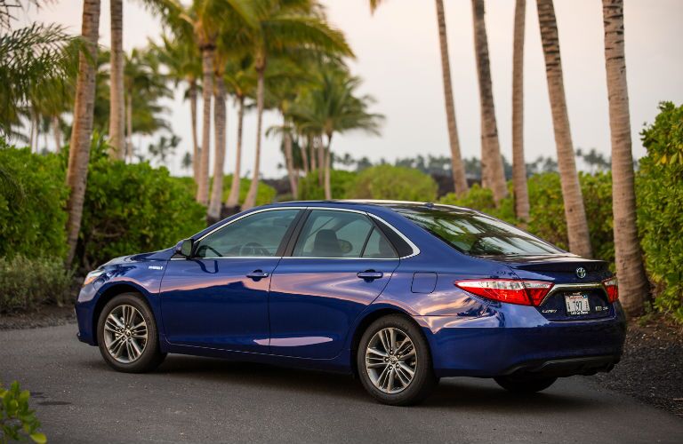 A left profile photo of the Toyota Camry Hybrid.