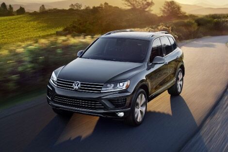 Volkswagen Touareg driving on country road