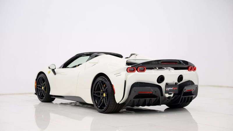 A rear 3/4 exterior view of the 2024 Ferrari SF90 Spider