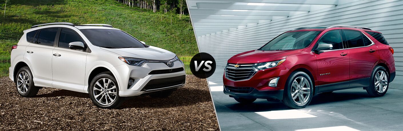 White Toyota RAV4 and red Chevrolet Equinox facing each other