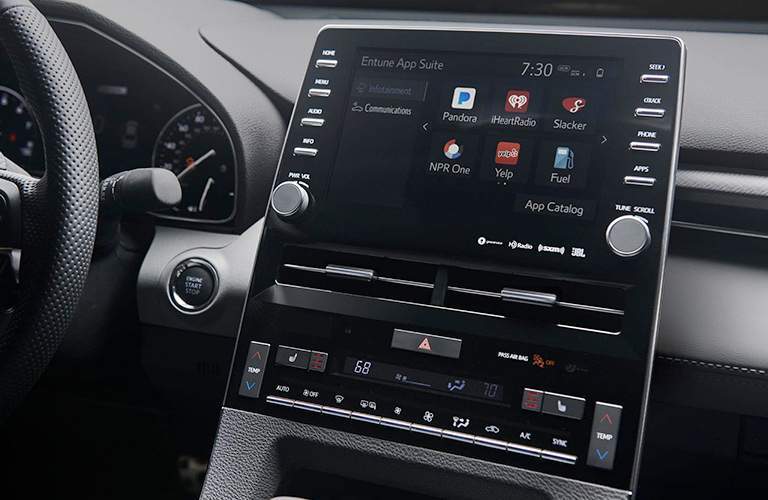 Touchscreen interface of 2019 Toyota Avalon with steering wheel in frame