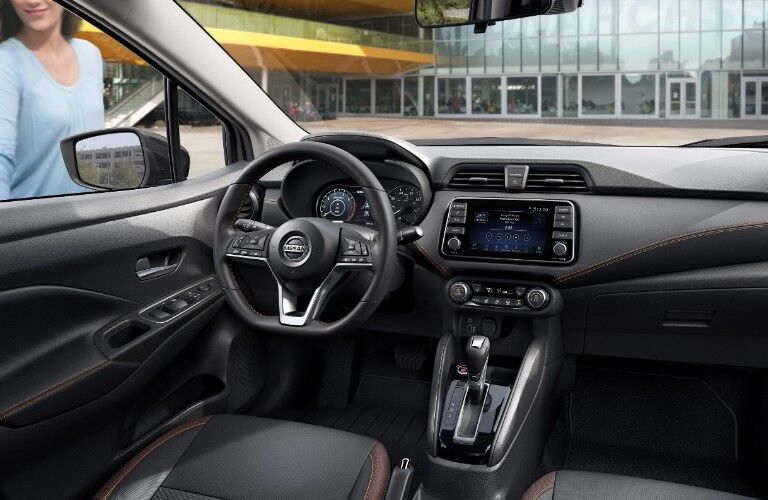 Steering wheel and dashboard inside the 2020 Nissan Versa