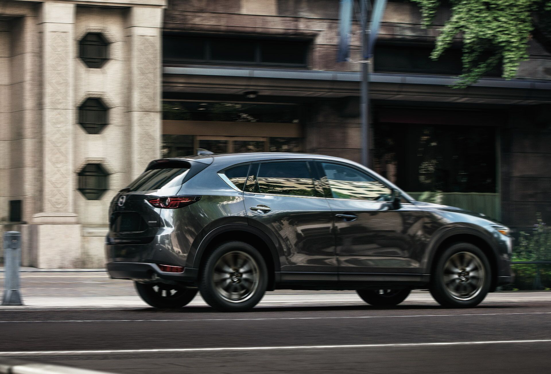 2020 Mazda CX-5 driving down a city road