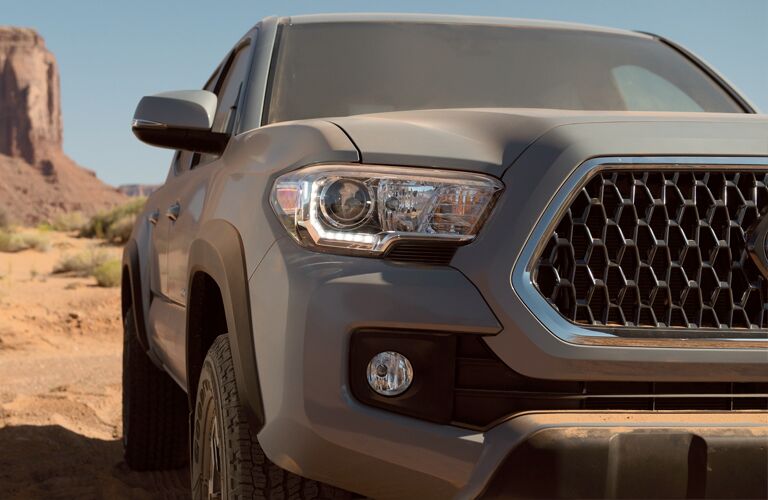Headlight and grille on grey 2019 Toyota Tacoma