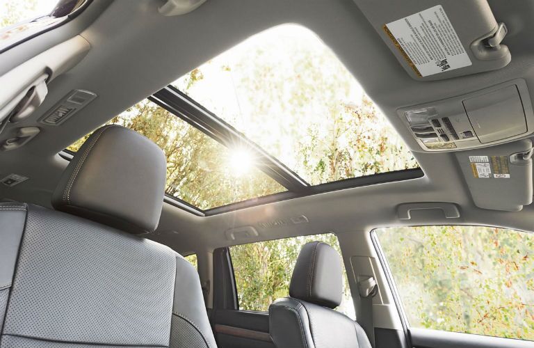 Moonroof and grey front seats in 2019 Toyota Highlander