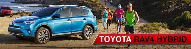 blue 2017 Toyota RAV4 Hybrid with runners