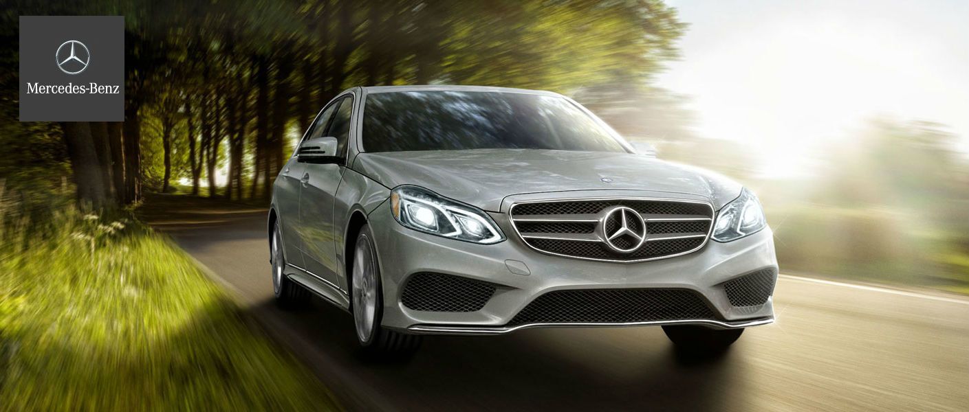 Mercedes-Benz e-Class driving around a forest