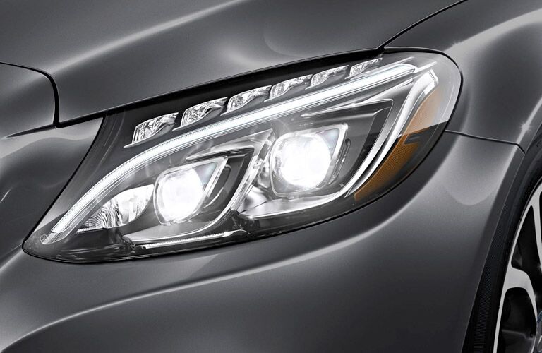 What kind of headlights does the Mercedes-Benz C-Class have?