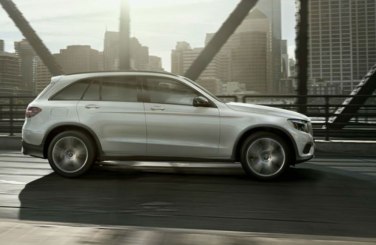 A right profile photo of the 2018 Mercedes-Benz GLC on the road.