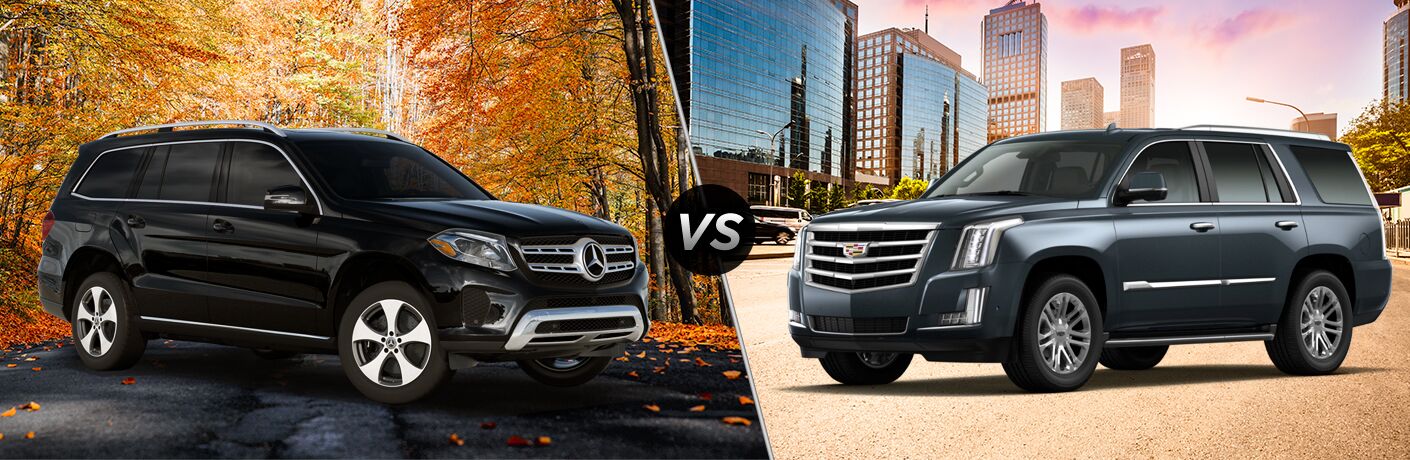 2019 MB GLS exterior front fascia and passenger side with fall trees vs 2019 Cadillac Escalade exterior front fascia and drivers side in city