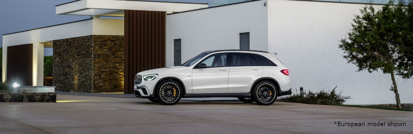 2020 MB AMG GLC exterior driver side in front of white building