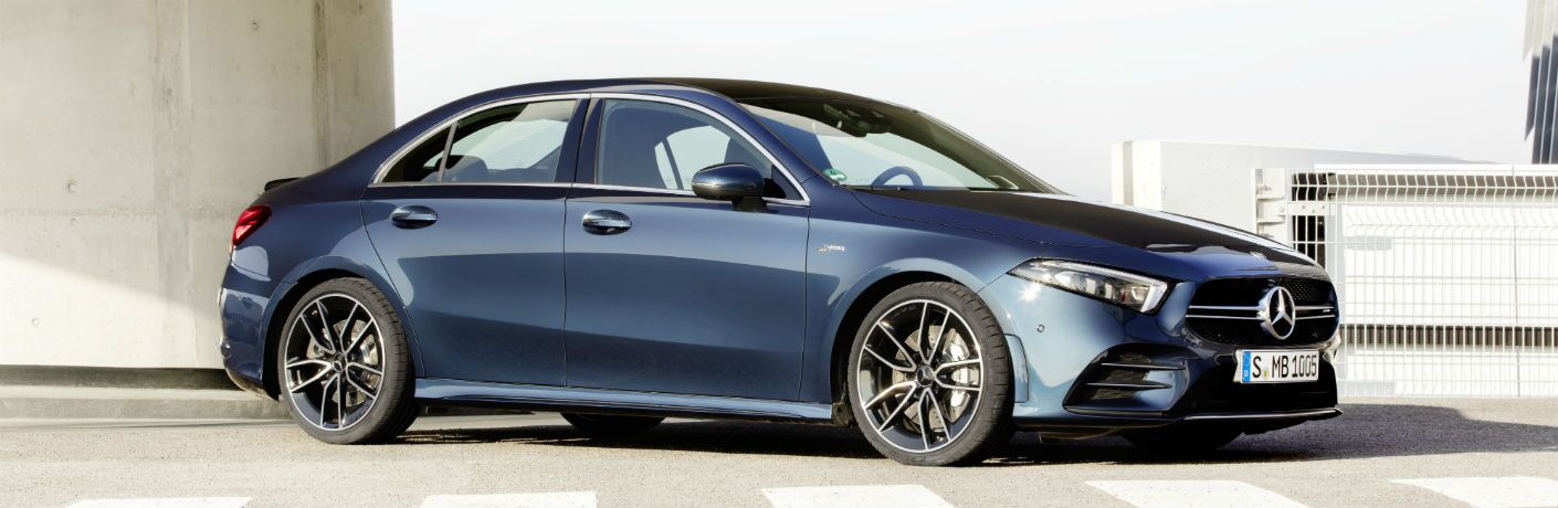 2020 MB A 35 exterior front fascia and passenger side in front of tan building