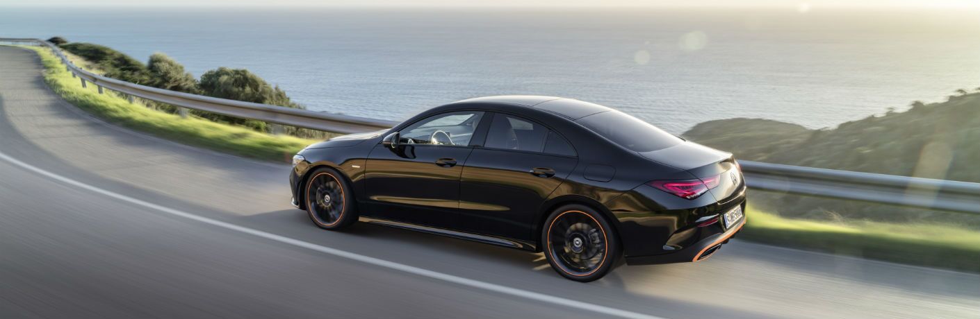 2020 MB CLA Coupe exterior back fascia and drivers side going fast on blurred highway