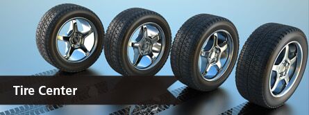 Image of tires with text that says "tire center"