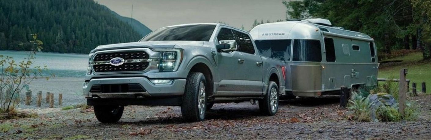 Used Ford F-150 FX2 Gray towing a trailer