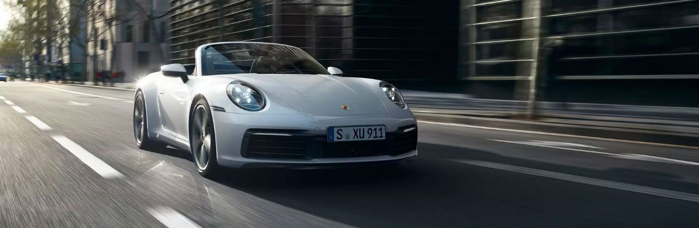 2020 Porsche 911 Carrera 4 Cabriolet driving on the road