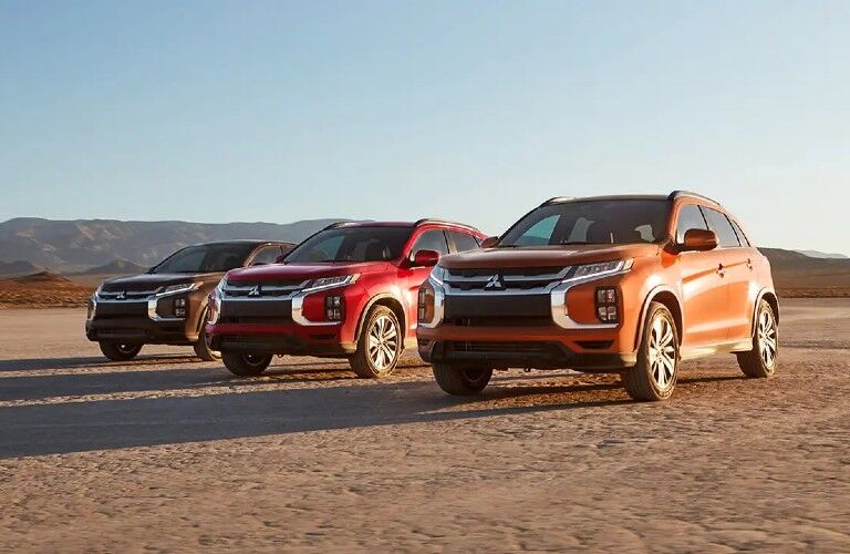 2020 Mitsubishi RVR red three models parked side by side