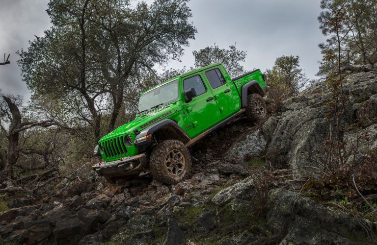 Side View of the 2021 Jeep Gladiator on rocky terrain