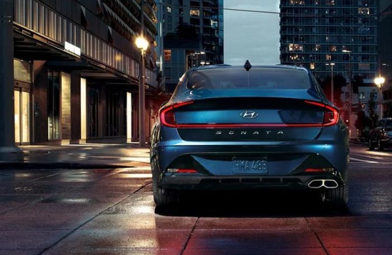 Rear view of a blue 2023 Hyundai Sonata.