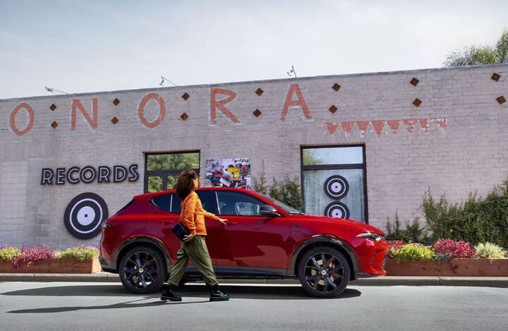 Side view of the 2024 Dodge Hornet red