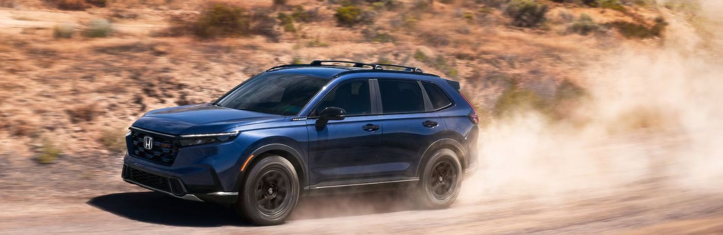 2026 Honda CR-V Hybrid Blue off-roading