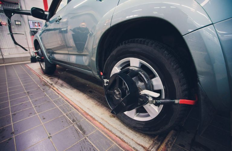 Front-End Alignment service being undertaken at a service center