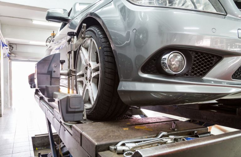 Front-End Alignment service being undertaken at a service center