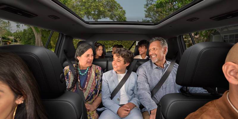 People occupying all three rows of seating in the 2024 Chevy Traverse.