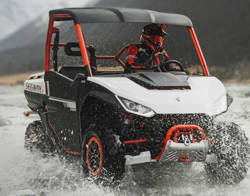 A Segway ATV fording a stream in Western Alberta