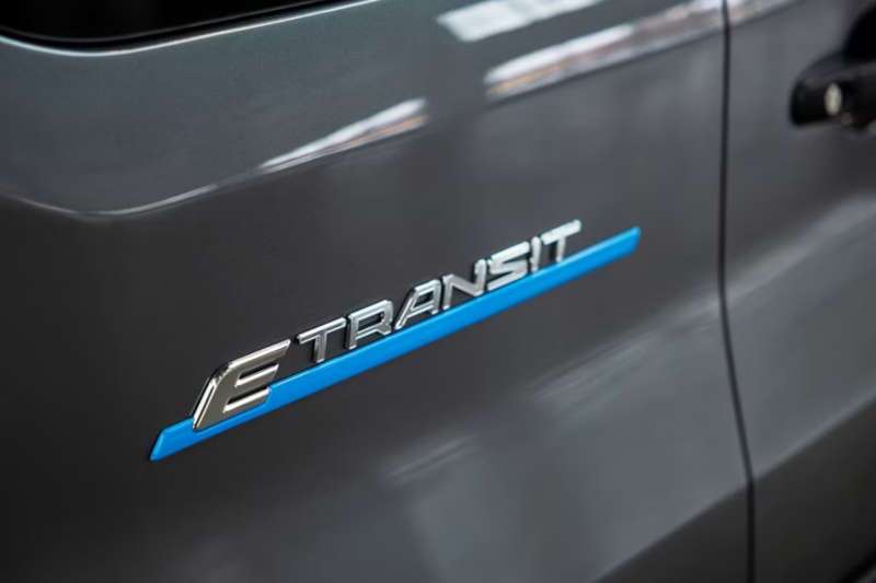 A closeup of the badge on the 2026 Ford E-Transit Cutaway