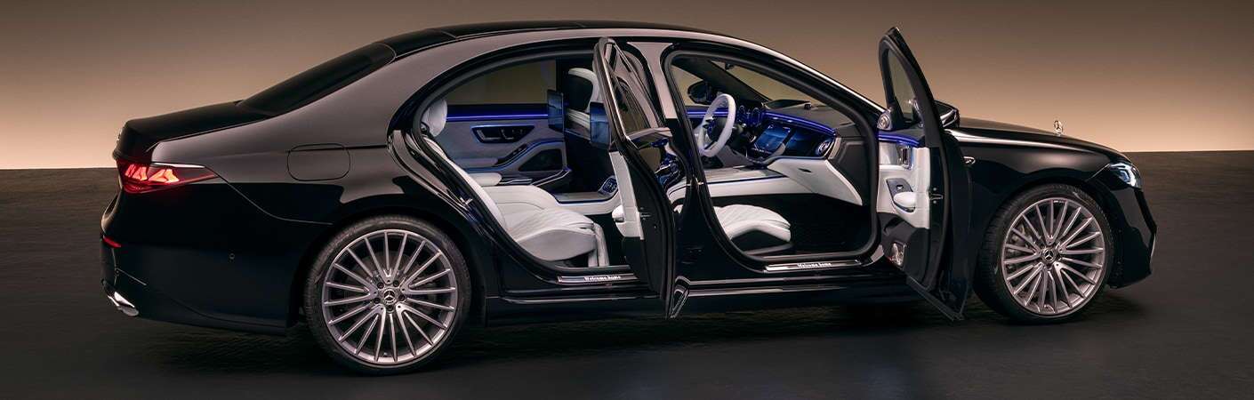 A side exterior doors-open view of the 2027 Mercedes-Benz S-Class Sedan