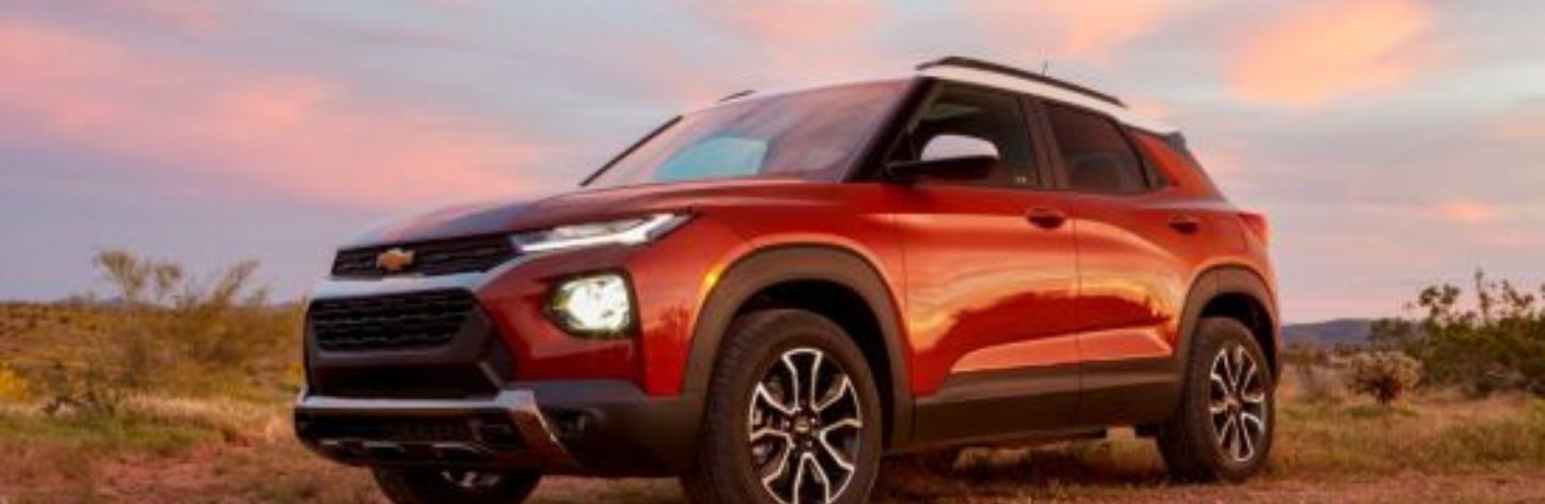 A 2017 Honda Ridgeline with two dirtbikes in its bed