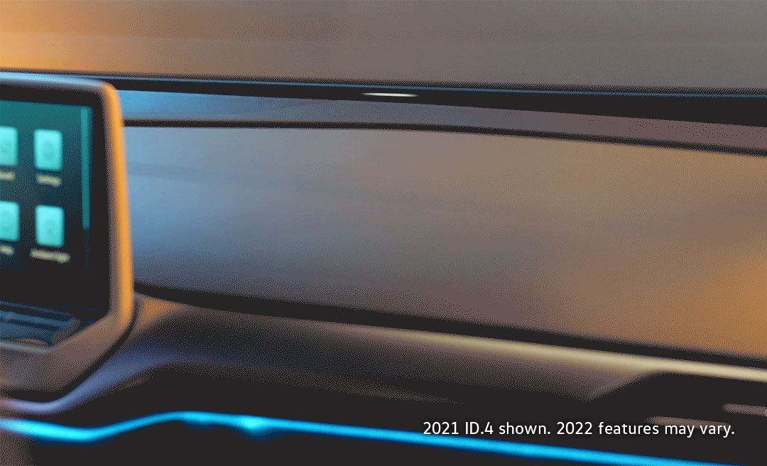 A light flickers across the dashboard of an ID.4
