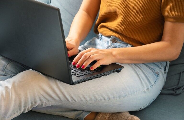 Woman using her laptop