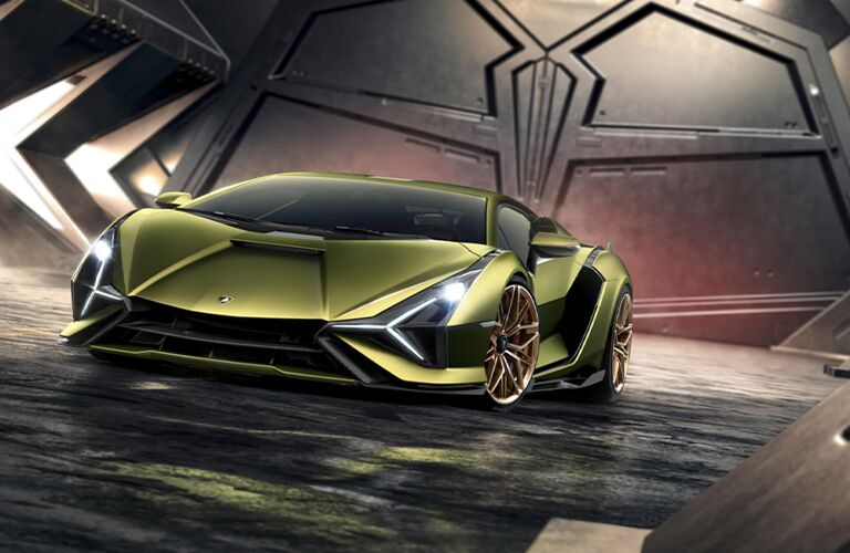 2021 Lamborghini Sian FKP 37 light green exterior front fascia driver side parked in metal room