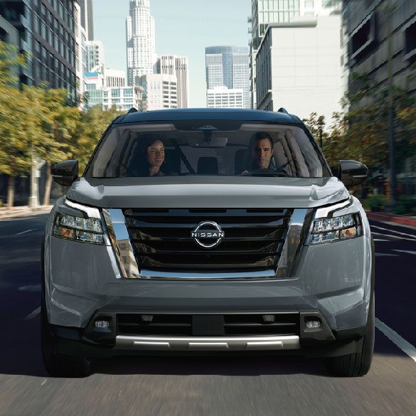2024 Nissan Pathfinder driving in the city