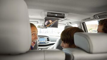 Available rear-seat Blu-ray Disc ™ entertainment system Available rear-seat Blu-ray Disc ™ entertainment system