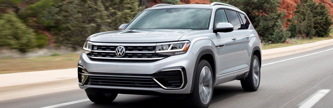 2023 VW Atlas Gray driving on the road